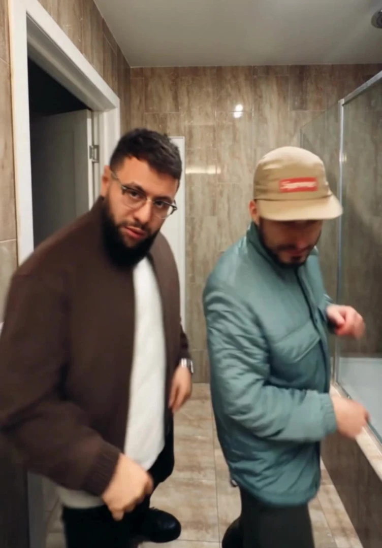Fully replace both people in @video1 with the people from the references: the person on the left is replaced with the person from @image1, the person on the rig…